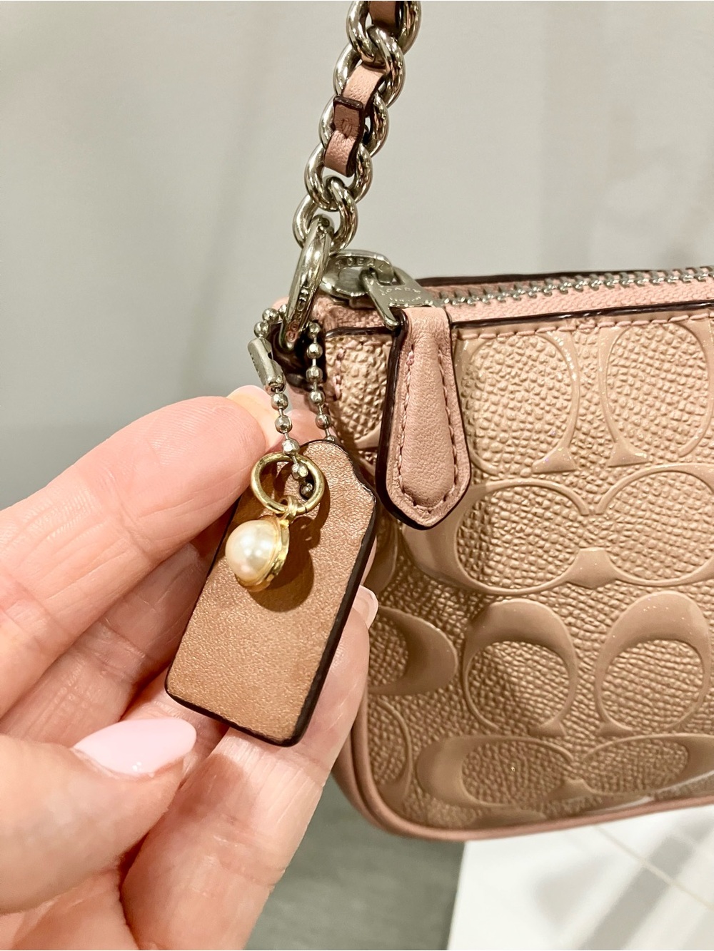Coach Nolita in Signature Embossed Patent Leather in a pink/blush shade - Picture 9 of 11